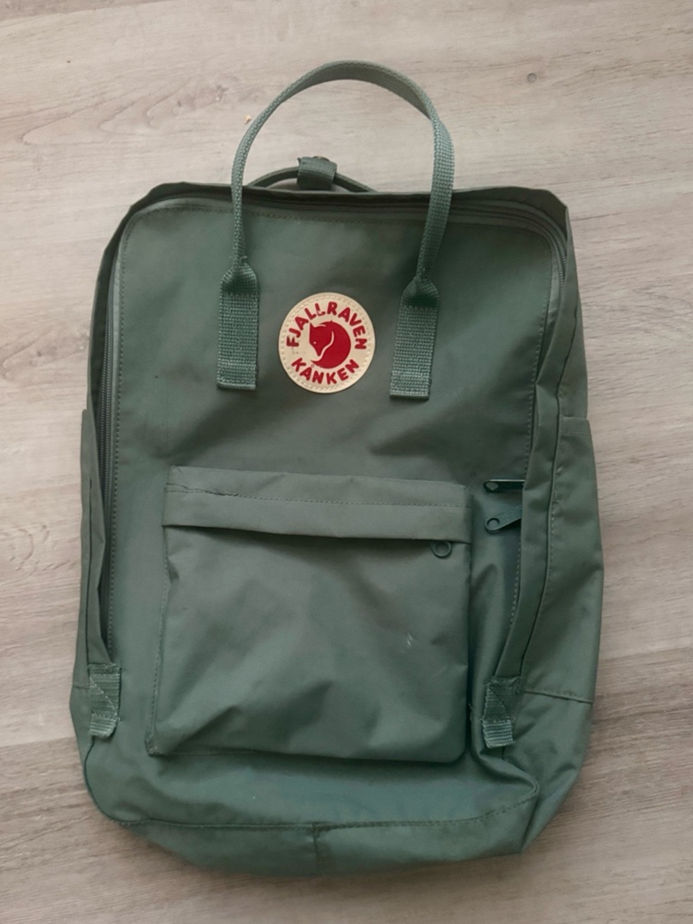 Fjallraven Kånken Backpack in Frost Green with Red Logo